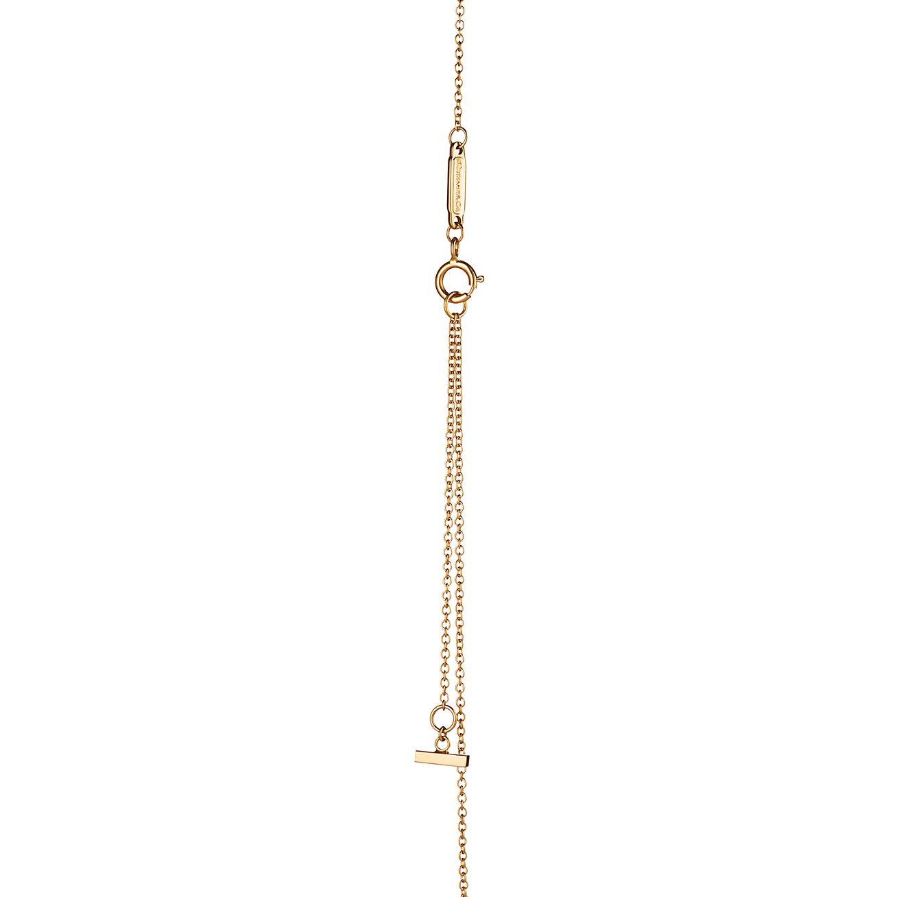 TIFFANY T SMILE PENDANT IN YELLOW GOLD WITH DIAMONDS, LARGE